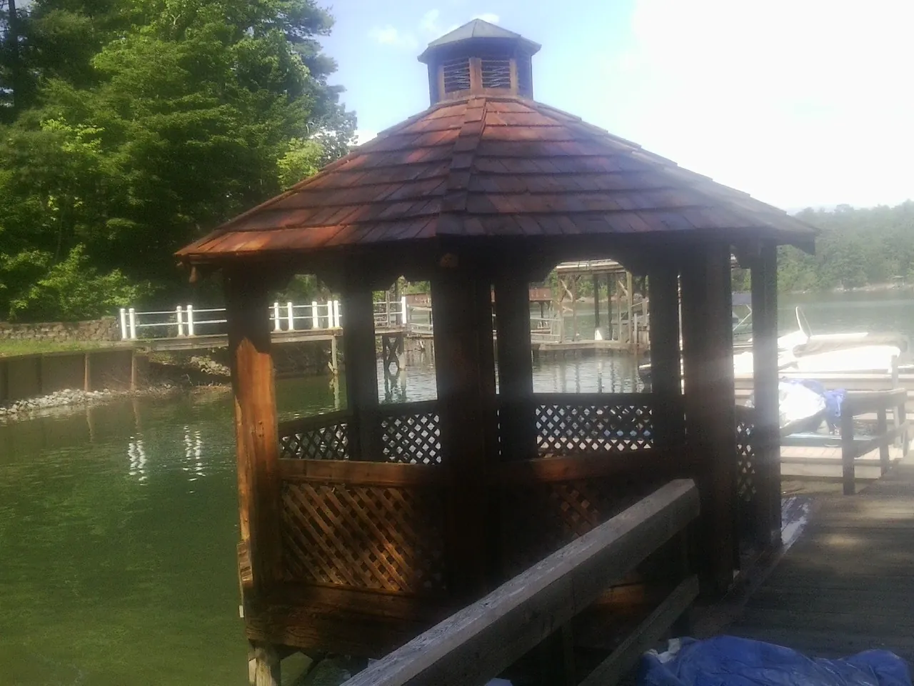 Cedar shake gazebo roof rebuilt on a lake dock in Millsboro