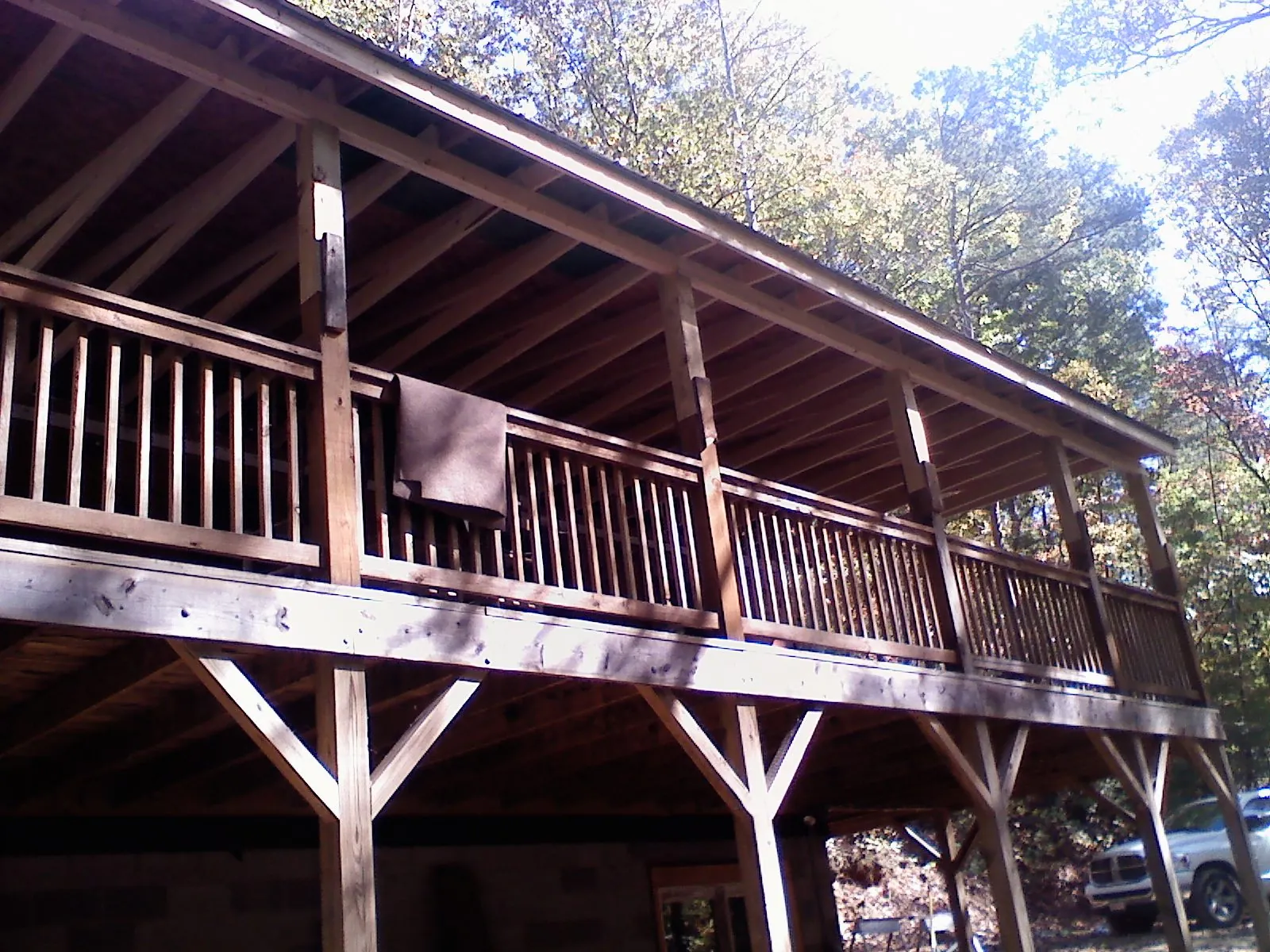 Timber framing under a new elevated porch and deck — Roof Leak Repair in Millsboro by Roofing Brothers